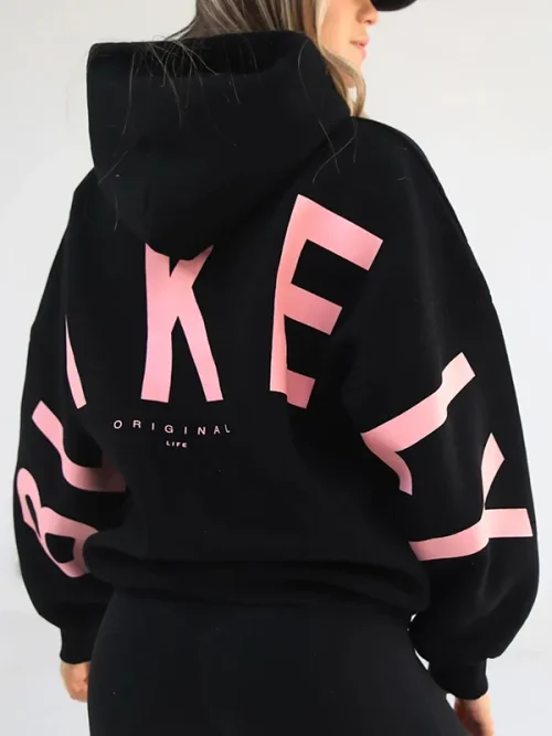 Custom black heavy hoodie with large letters printed on the back